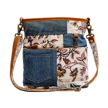 Load image into Gallery viewer, Patchwork crossbody bag with floral and denim patterns on a white background