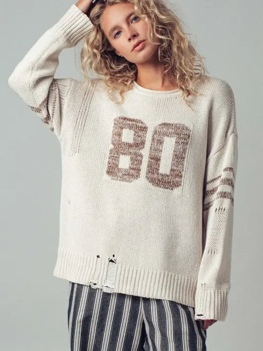 vintage inspired distressed sweater with 80 grahic