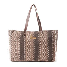Load image into Gallery viewer, Tote bag with patterned design and visible brand logo on a white background

