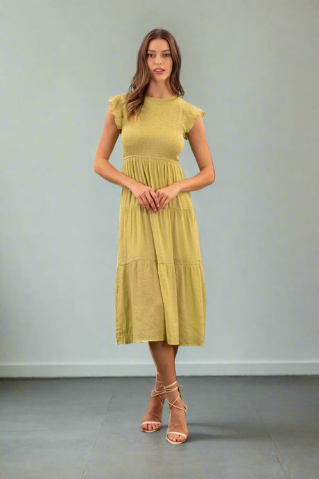 lime colored tiered dress with flutter sleeve