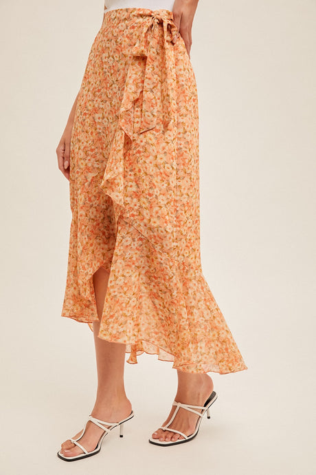 Wrap style floral midi skirt with asymmetrical hem line